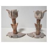 Pair of stone flower shaped candlesticks