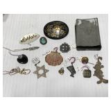 Assorted jewelry slides, pins, etc