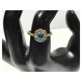Blue & clear stone ring w/ gold toned band