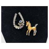 Horseshoe and horse brooches