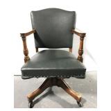 Vintage wood cushioned rolling desk chair