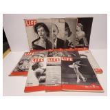 12 vintage Life magazines