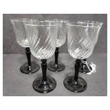 5 small stemware glasses with black stems