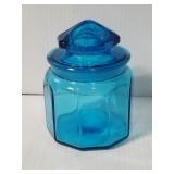 Small blue glass covered jar