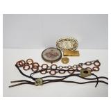 Vintage belt buckle, bolos, and makeup