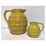 Pair of unique Tag ceramic yellow pitchers