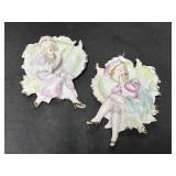 Man & woman ceramic wall plaques