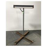 Adjustable height saw horse roller stand