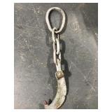 Large old heavy metal ship anchor or chain hook