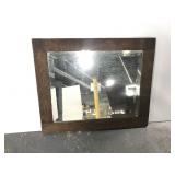 Old oak framed beveled mirror