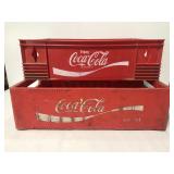 Two Coca Cola plastic crates