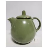Green ceramic teapot