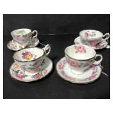 Four pink flower tea cups and saucers