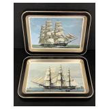 Two vintage sailboat tin trays