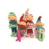 Four vintage elf ornaments
