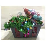 Basket of Christmas decor and bulbs