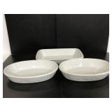 Three large WCL stoneware baking dishes