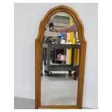 Wood framed wall mirror