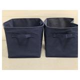 Two collapsible storage bins in blue