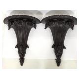 Two resin carved half circle solid wall shelves