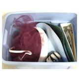 Tote of assorted hat crafting and inventory book