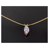 Gold tone marquise stone necklace