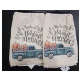 Two Harvest truck tea towels