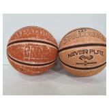 Two Spalding basket balls