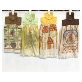 Four hanging kitchen towels