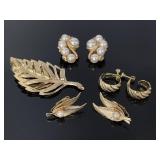 Collection of vintage gold tone earrings & brooch