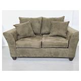 Green microfiber love seat with pillow back