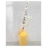 Large stone jug with faux flowers