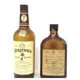 Pair of vintage whisky bottles