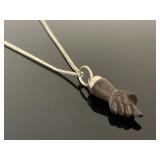 Petite carved wooden hand pendant necklace