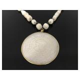 Carved stone pendant necklace with stone beads