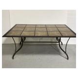 Metal patio table with stone tile top