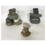 Trio of garden rock statues