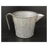 Galvanized metal watering pail