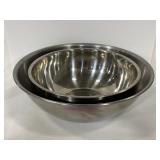 Two huge stainless steel mixing bowls