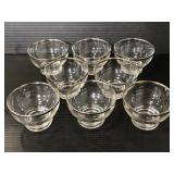 Eight Mid Century Modern silver edged small bowls