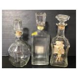 Three vintage glass decanters