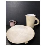 Homemade pottery pitchers and platter