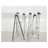 Six metal tripods