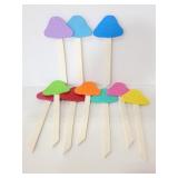 Ten wood Mushroom on wood yard stakes