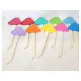 Ten wood Mushroom on wood yard stakes