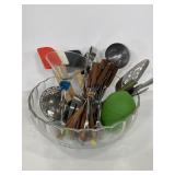 Lot of retro kitchen utensils in glass mixing bowl