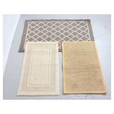 Three kitchen rugs