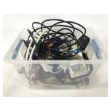Bin full of various cords and adapters