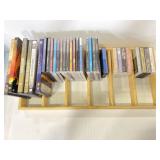 Lot of assorted DVDs, CDs, and tapes