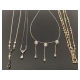 Four petite vintage chain necklaces